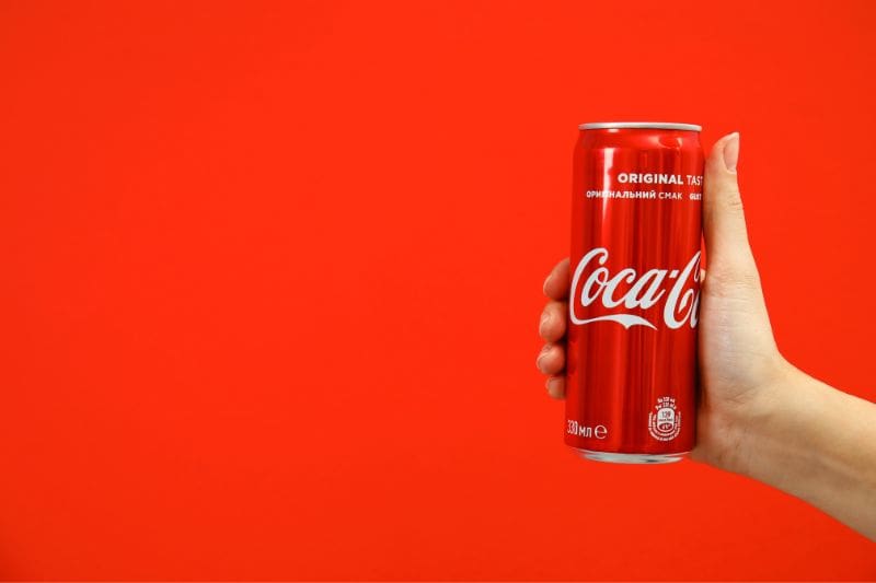 man-holding-coke-can